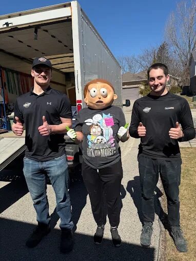The Youngsters Services crew in front of the moving truck